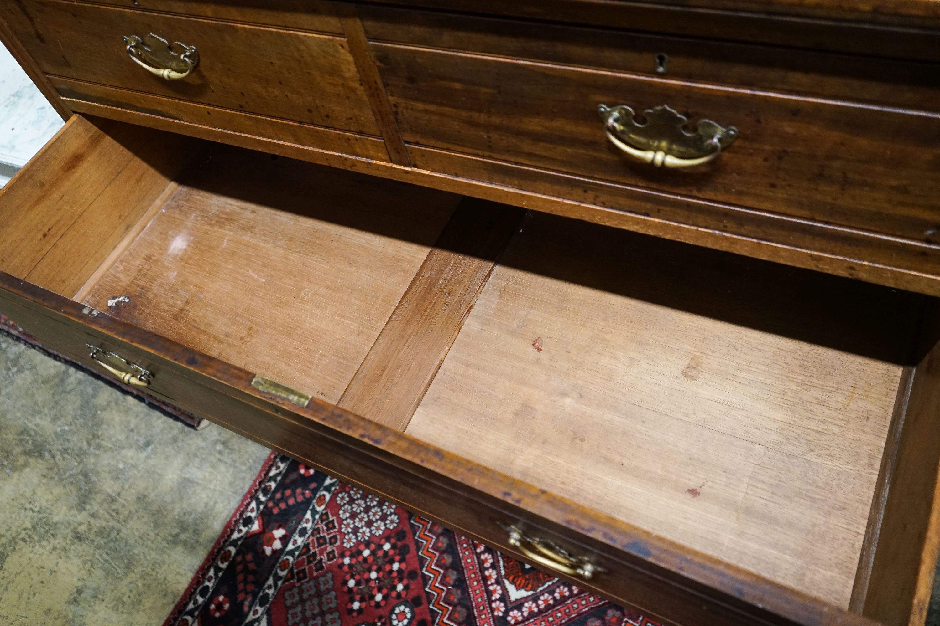 A late Victorian walnut chest of drawers, width 120cm, depth 52cm, height 118cm